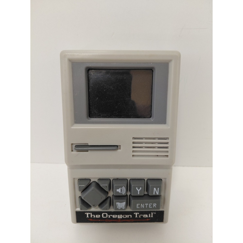 The Oregon Trail‎ Handheld Electronic Game Basic Fun 09597 Retro Travel Toy Grey